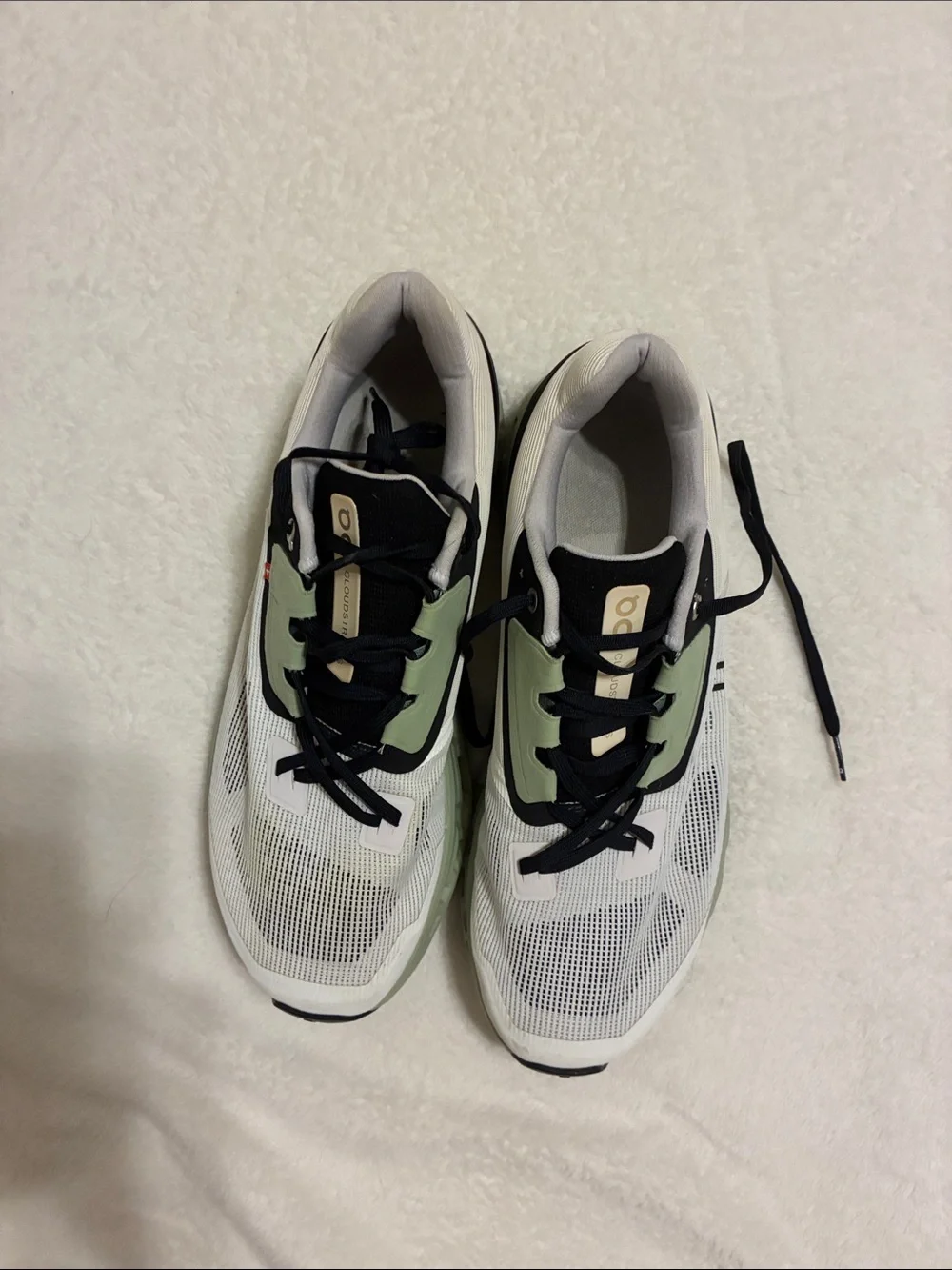 On Running Men’s White & Light Green Sneakers with Black Accents